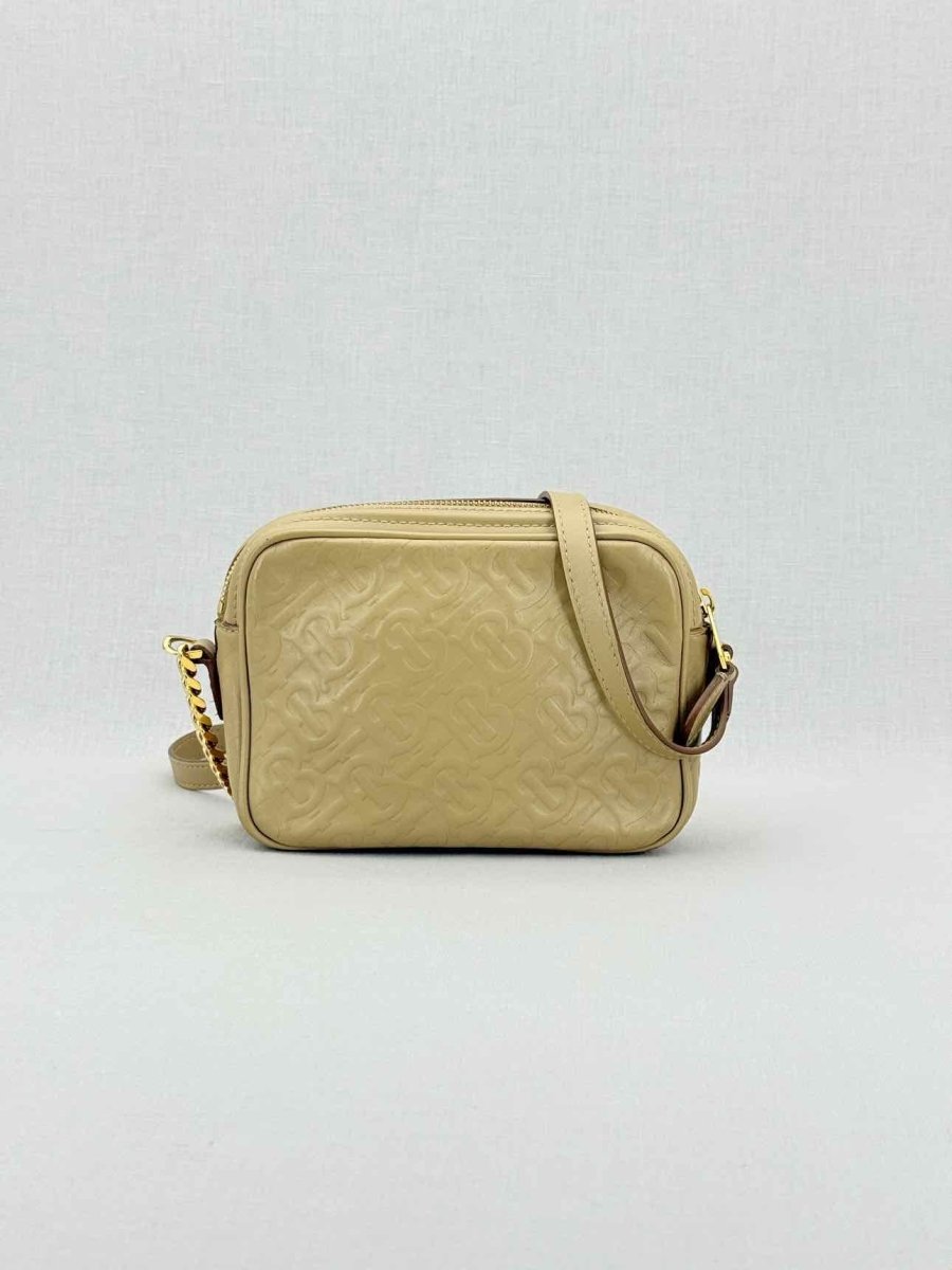 Pre - loved BURBERRY Beige Monogram Embossed Crossbody at Reems Closet