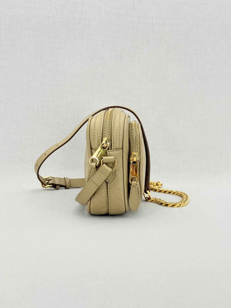 Pre - loved BURBERRY Beige Monogram Embossed Crossbody at Reems Closet
