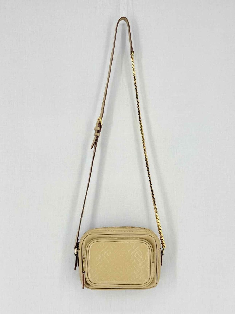 Pre - loved BURBERRY Beige Monogram Embossed Crossbody at Reems Closet