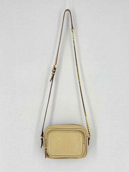 Pre - loved BURBERRY Beige Monogram Embossed Crossbody at Reems Closet