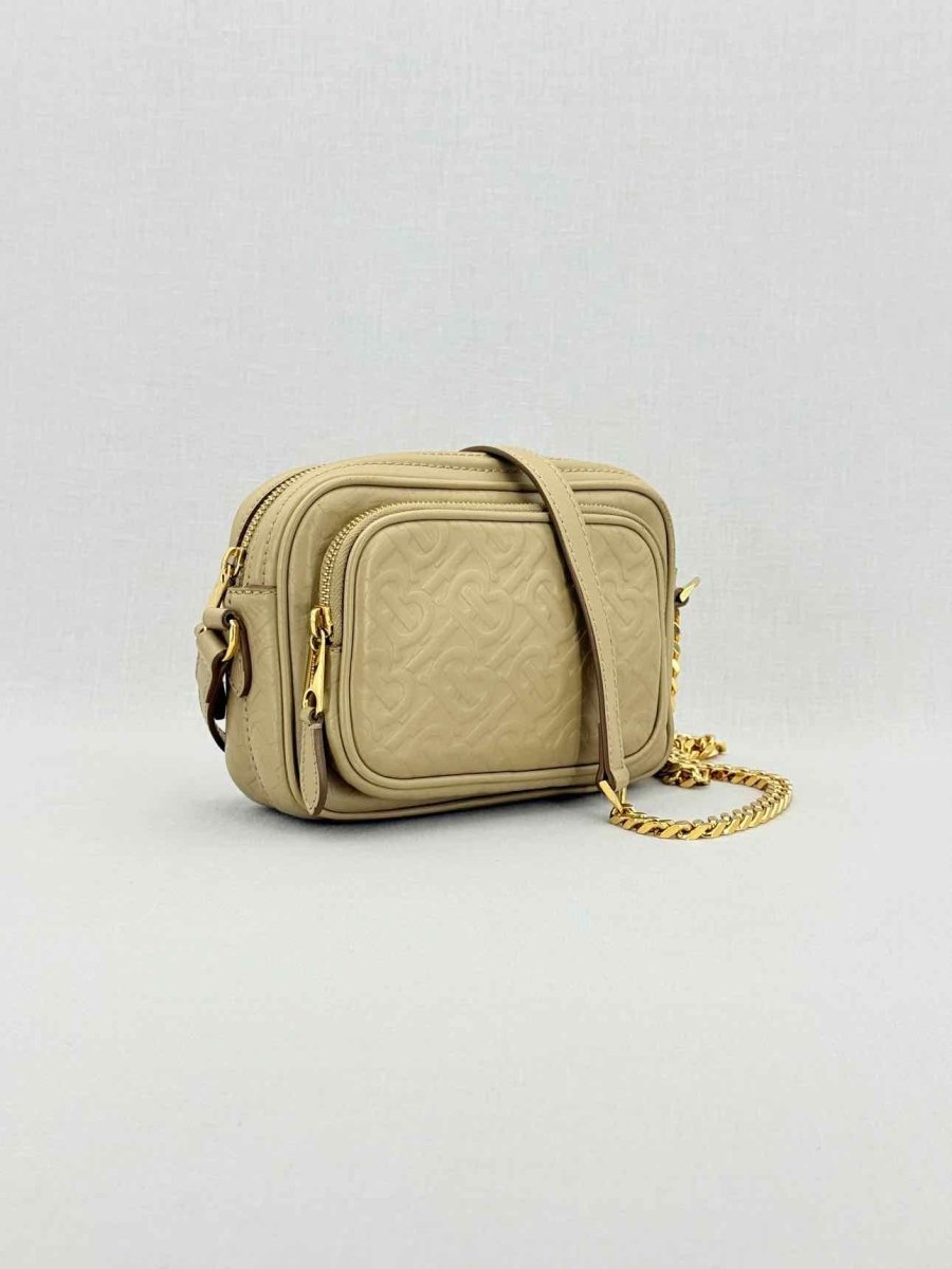 Pre - loved BURBERRY Beige Monogram Embossed Crossbody at Reems Closet