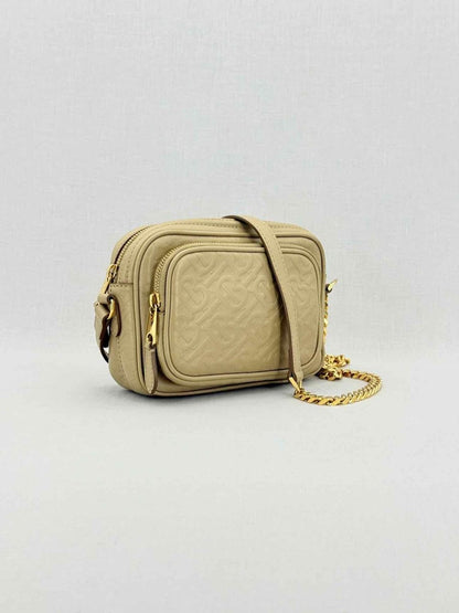 Pre - loved BURBERRY Beige Monogram Embossed Crossbody at Reems Closet