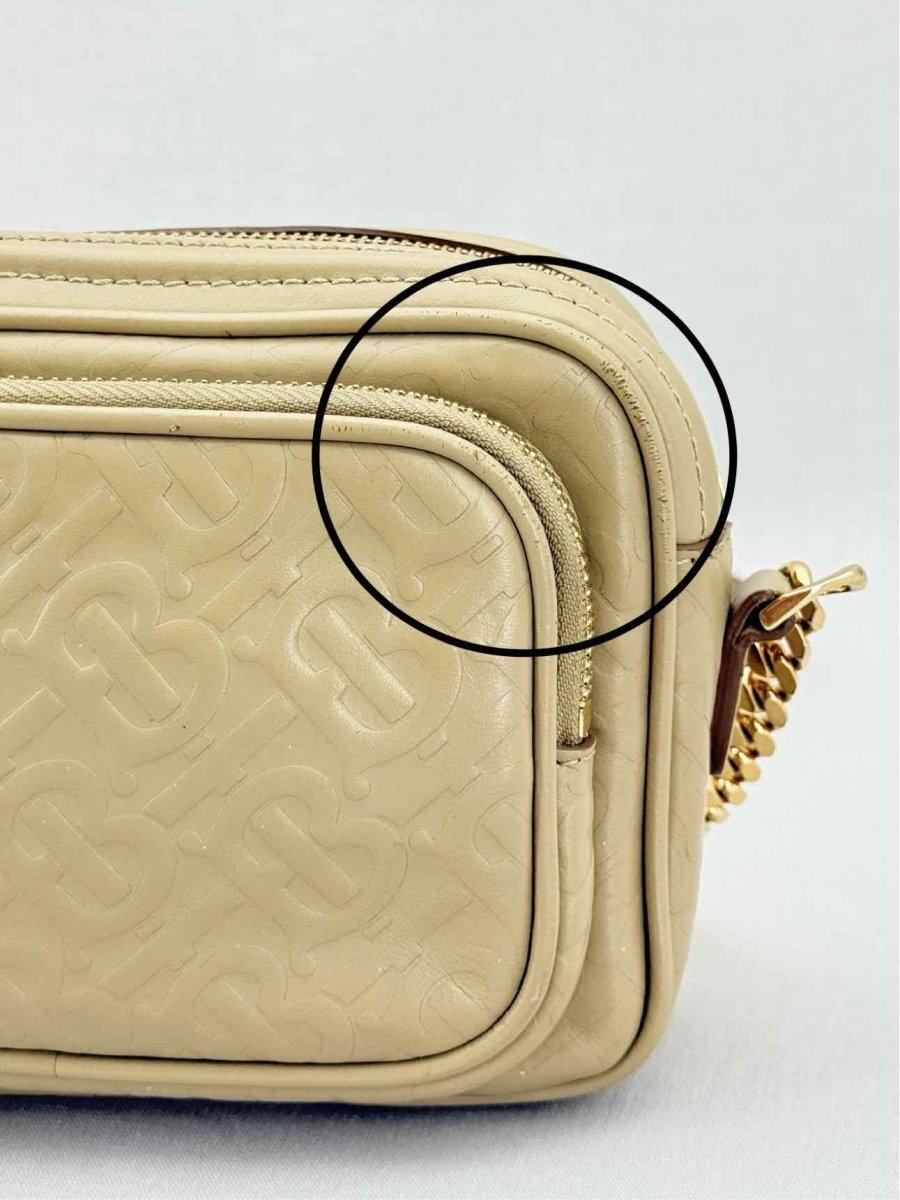 Pre - loved BURBERRY Beige Monogram Embossed Crossbody at Reems Closet