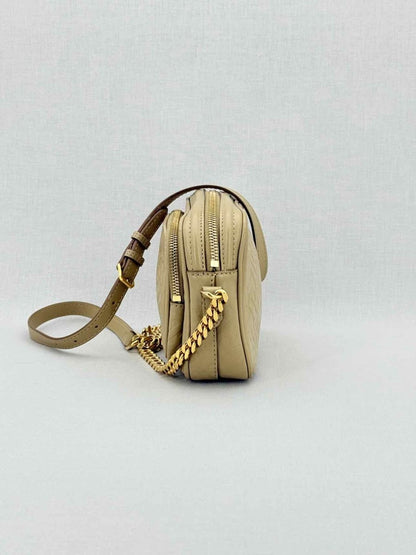 Pre - loved BURBERRY Beige Monogram Embossed Crossbody at Reems Closet