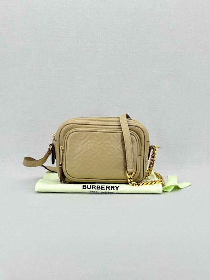 Pre - loved BURBERRY Beige Monogram Embossed Crossbody at Reems Closet