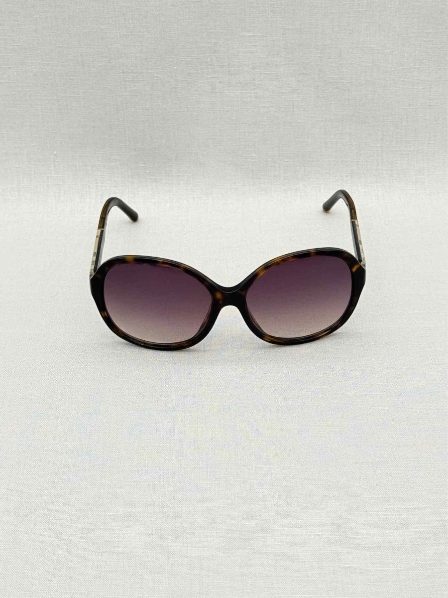 Pre-loved BURBERRY Dark brown Sunglasses at Reems Closet