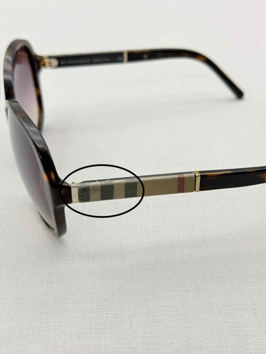 Pre-loved BURBERRY Dark brown Sunglasses at Reems Closet