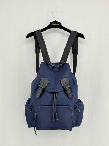 Pre - loved BURBERRY Navy Logo Print Backpack at Reems Closet