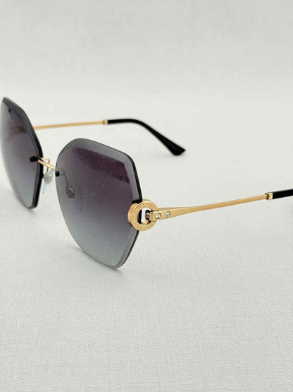 Pre - loved BVLGARI Grey Sunglasses at Reems Closet
