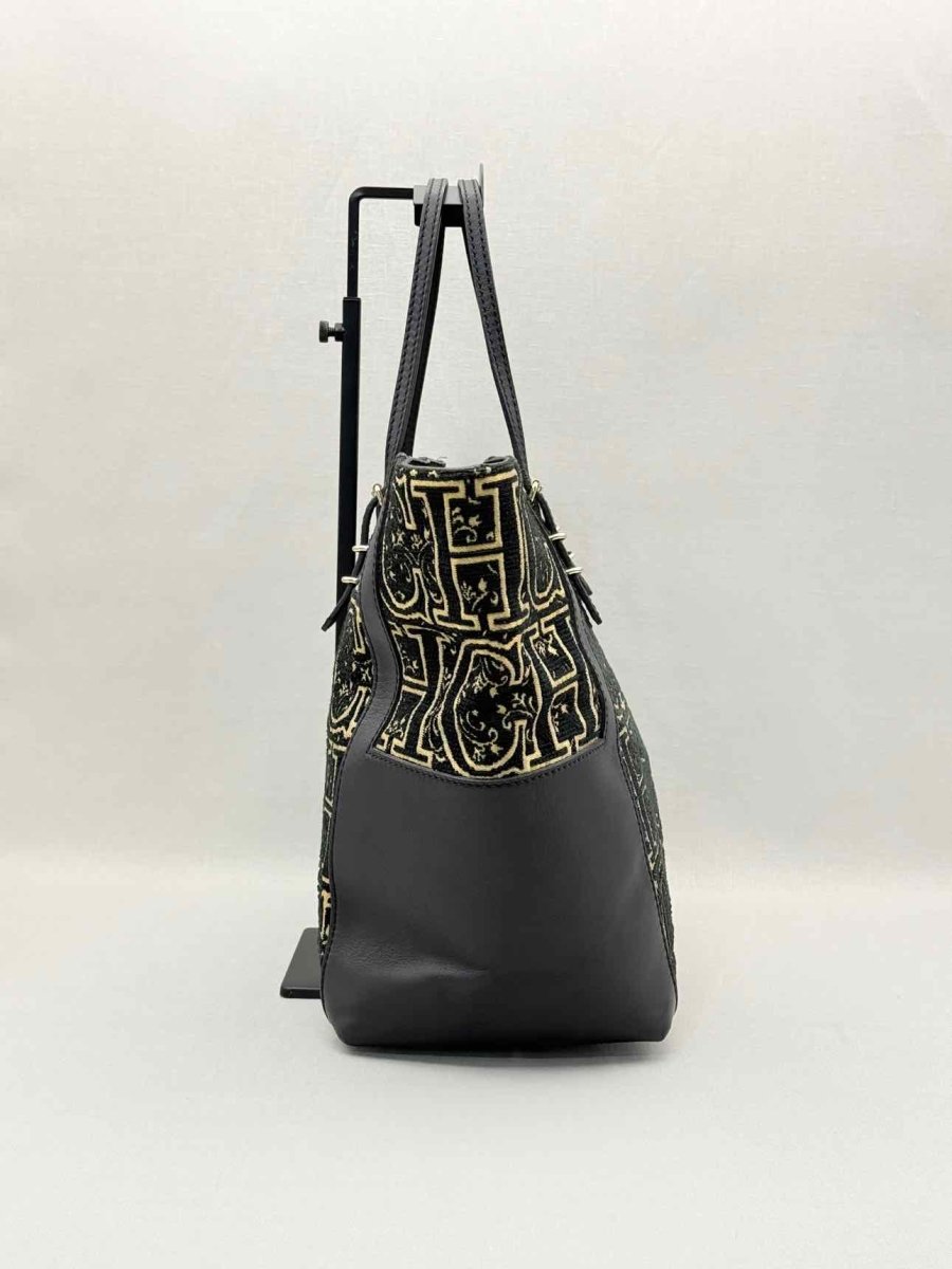 Pre-loved CAROLINA HERRERA Black & Gold Monogram Tote Bag at Reems Closet