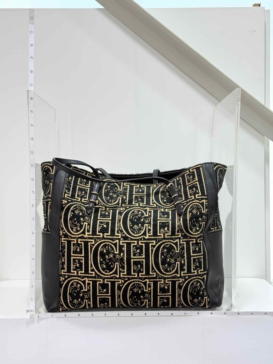 Pre-loved CAROLINA HERRERA Black & Gold Monogram Tote Bag at Reems Closet