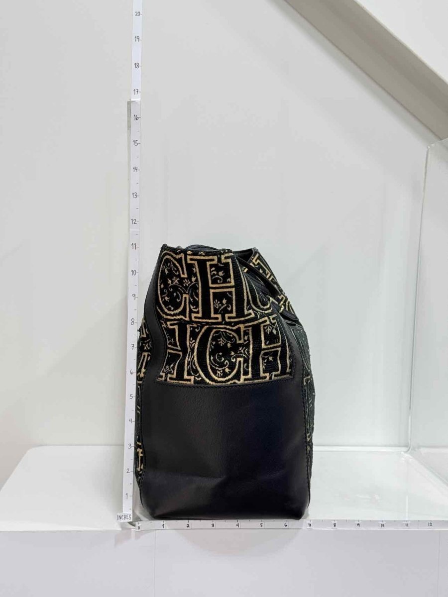 Pre-loved CAROLINA HERRERA Black & Gold Monogram Tote Bag at Reems Closet