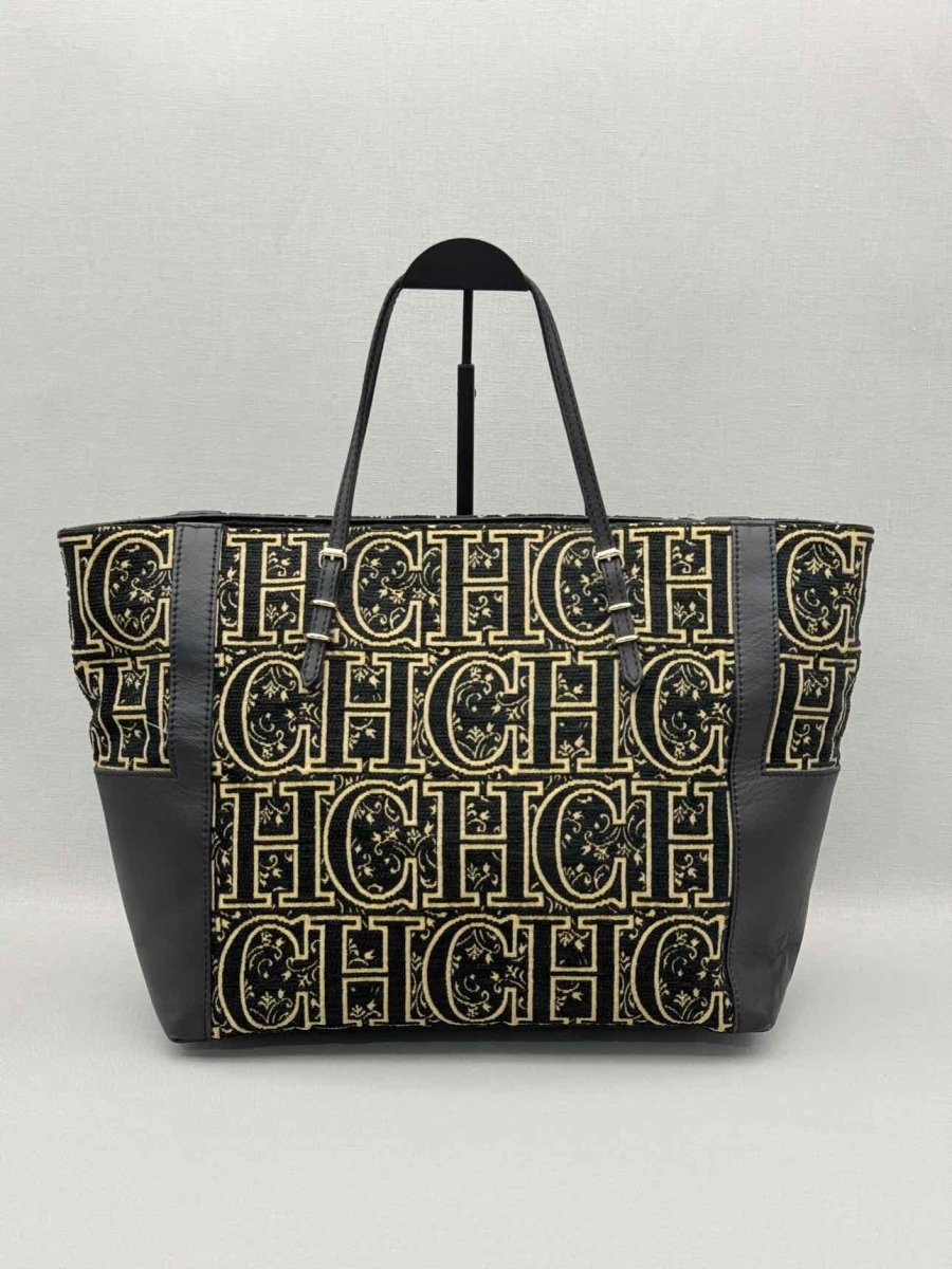 Pre-loved CAROLINA HERRERA Black & Gold Monogram Tote Bag at Reems Closet