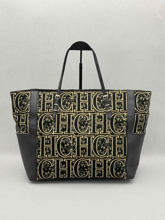 Pre-loved CAROLINA HERRERA Black & Gold Monogram Tote Bag at Reems Closet