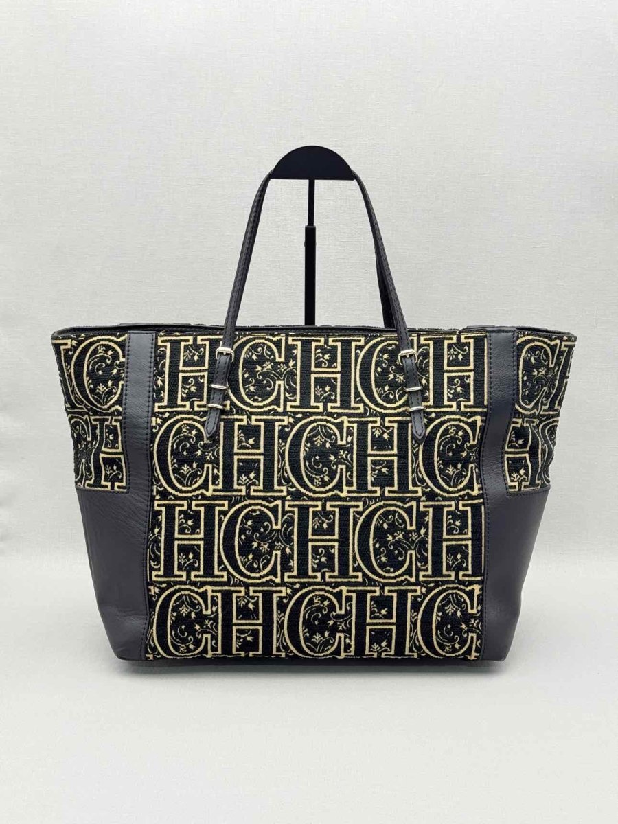 Pre-loved CAROLINA HERRERA Black & Gold Monogram Tote Bag at Reems Closet