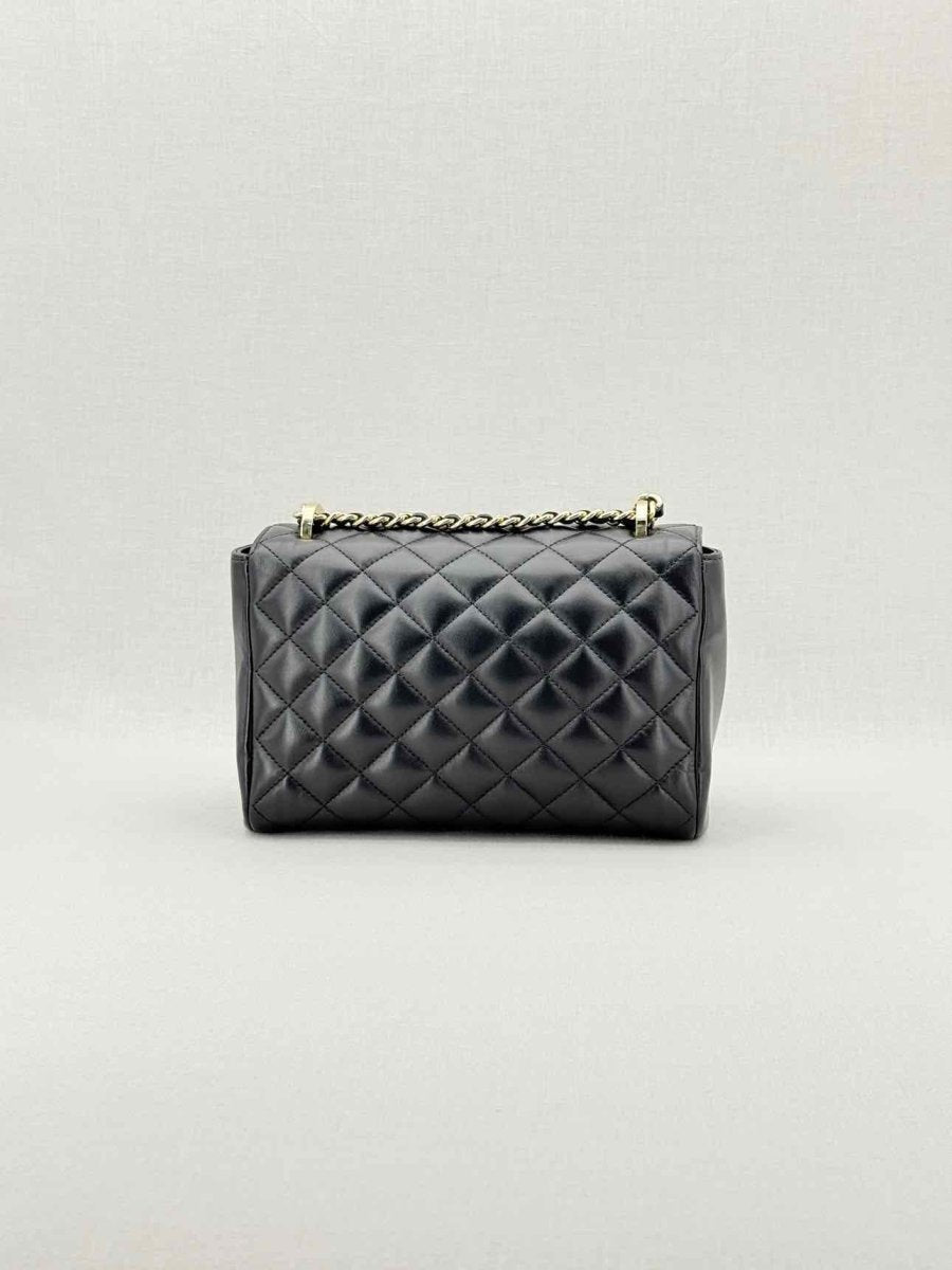 Pre - loved CAROLINA HERRERA Black Quilted Shoulder Bag at Reems Closet