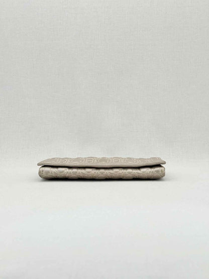 Pre - loved CAROLINA HERRERA Grey Monogram Clutch at Reems Closet