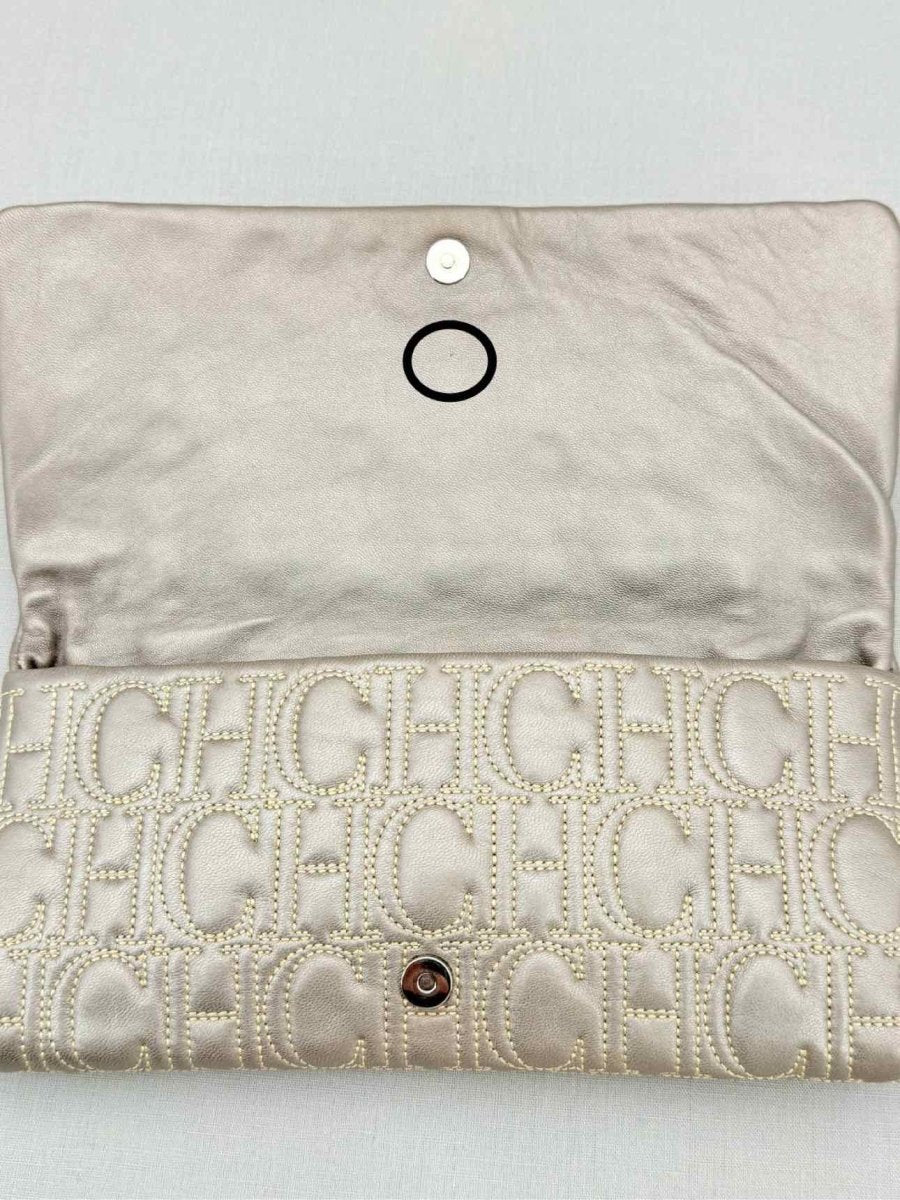 Pre - loved CAROLINA HERRERA Grey Monogram Clutch at Reems Closet