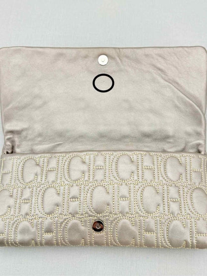 Pre - loved CAROLINA HERRERA Grey Monogram Clutch at Reems Closet