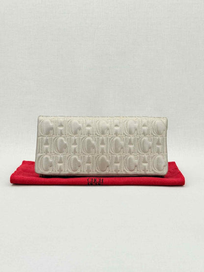 Pre - loved CAROLINA HERRERA Grey Monogram Clutch at Reems Closet