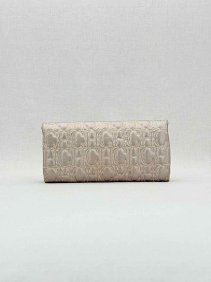 Pre - loved CAROLINA HERRERA Grey Monogram Clutch at Reems Closet