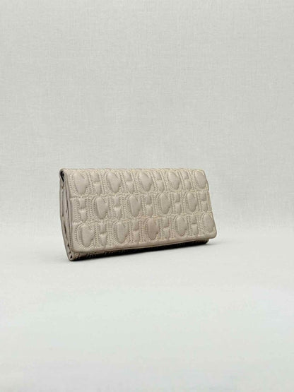Pre - loved CAROLINA HERRERA Grey Monogram Clutch at Reems Closet