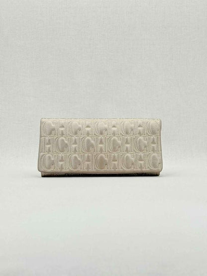Pre - loved CAROLINA HERRERA Grey Monogram Clutch at Reems Closet