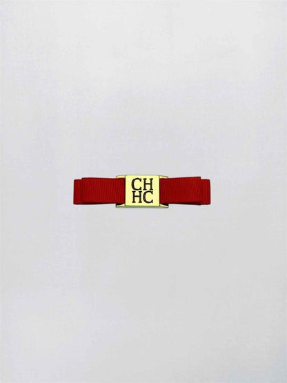 Pre-loved CAROLINA HERRERA Red Logo Plaque Hair Clip at Reems Closet