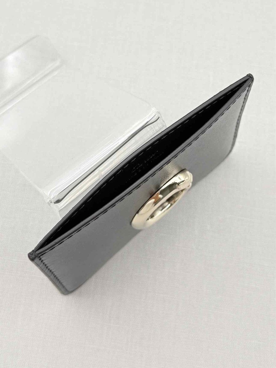 Pre-loved CARTIER Black Card Holder at Reems Closet