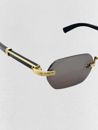 Pre - loved CARTIER Premiere de Cartier Black & Gold Sunglasses at Reems Closet