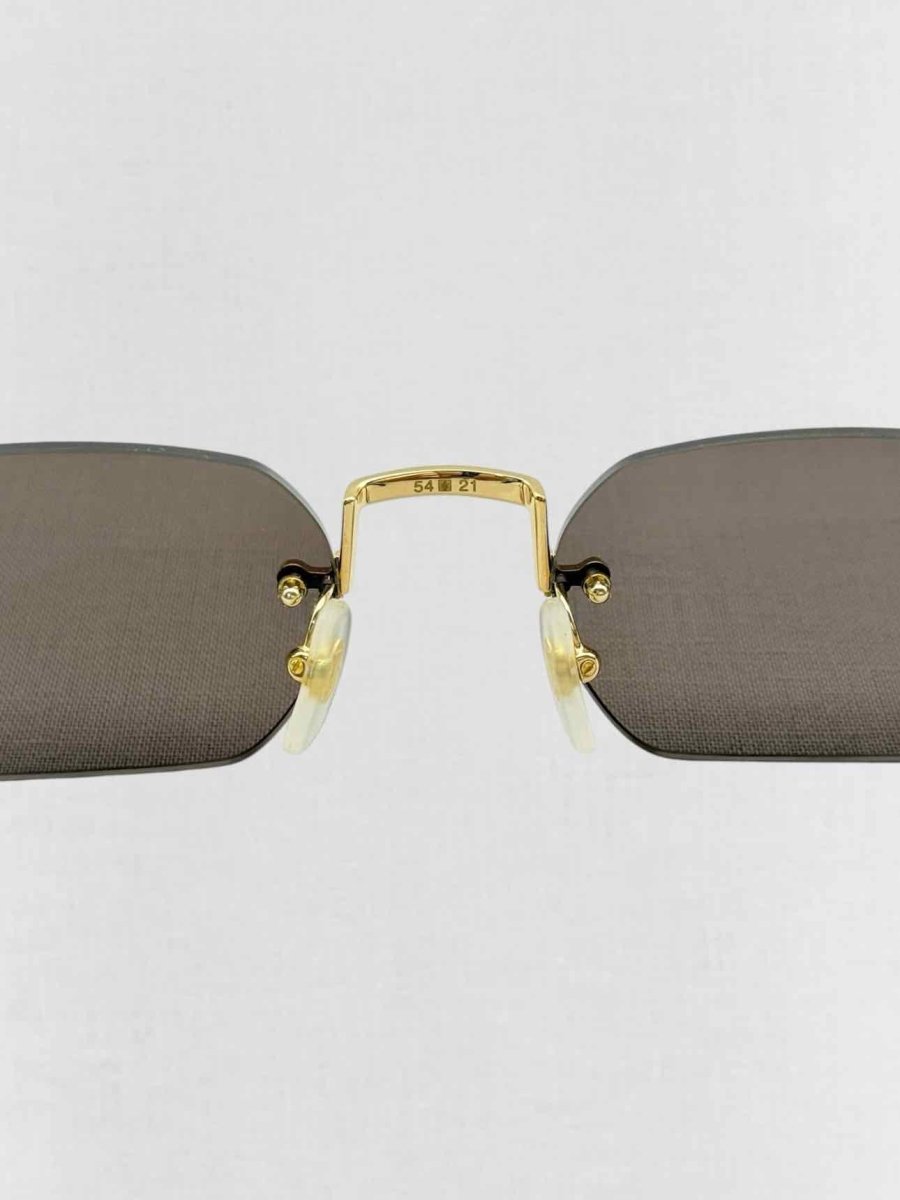 Pre - loved CARTIER Premiere de Cartier Black & Gold Sunglasses at Reems Closet