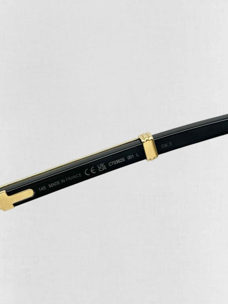 Pre - loved CARTIER Premiere de Cartier Black & Gold Sunglasses at Reems Closet