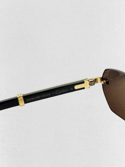 Pre - loved CARTIER Premiere de Cartier Black & Gold Sunglasses at Reems Closet