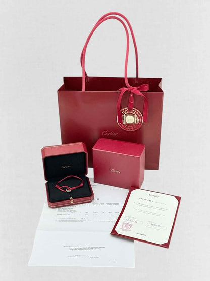 Pre - loved CARTIER Trinity Cord Bracelet at Reems Closet