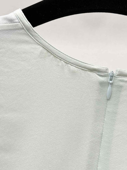 Pre-loved CELINE Pastel Green Size US 8 Blouse at Reems Closet