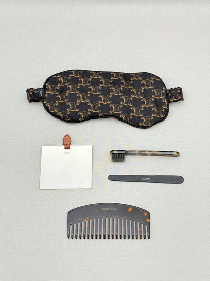 Pre-loved CELINE Triomphe Black & Tan Travel Kit at Reems Closet