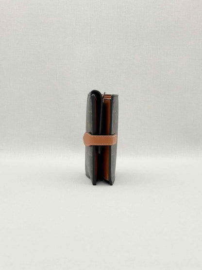 Pre-loved CELINE Triomphe Black & Tan Travel Kit at Reems Closet