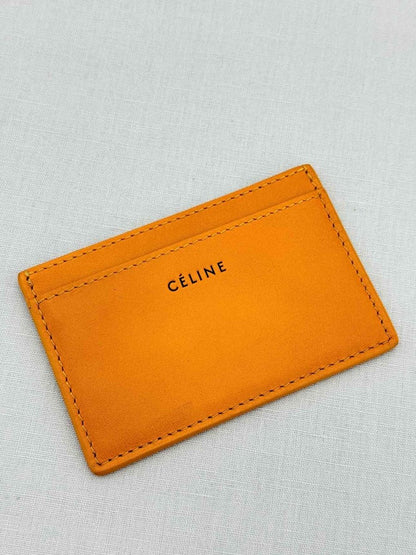 Pre - loved CELINE Yellow Card Holder at Reems Closet