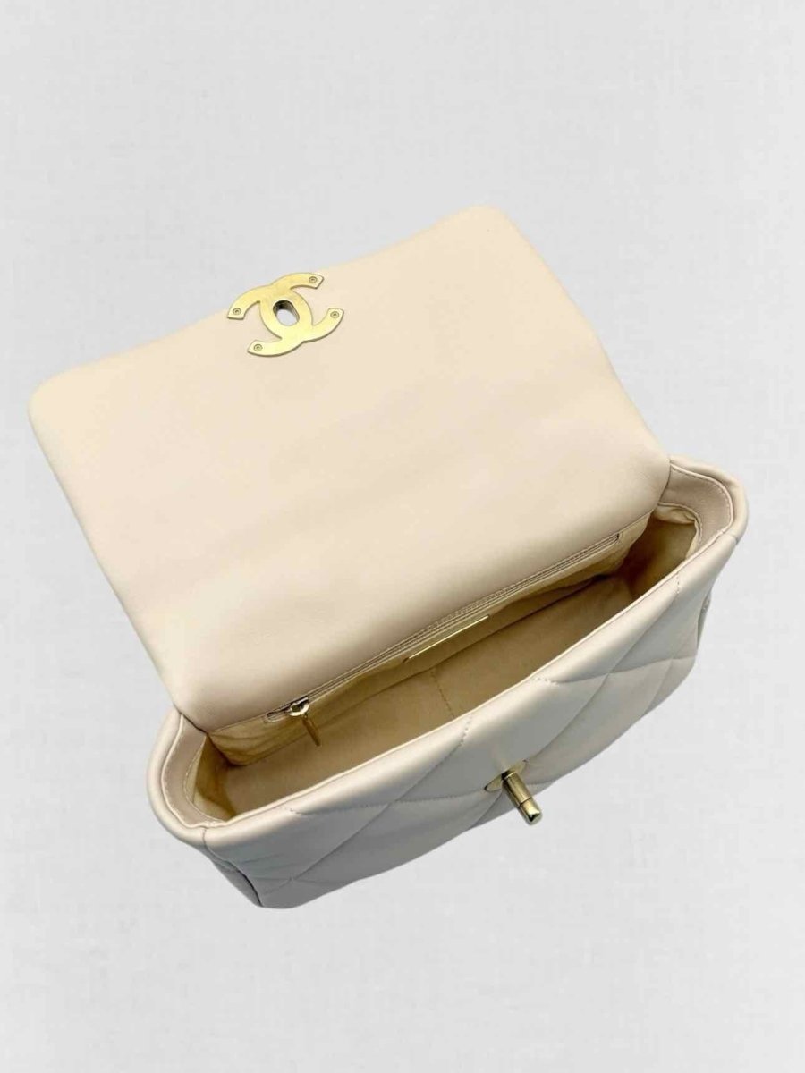 Pre - loved CHANEL 19 Flap Cream Quilted Shoulder Bag at Reems Closet