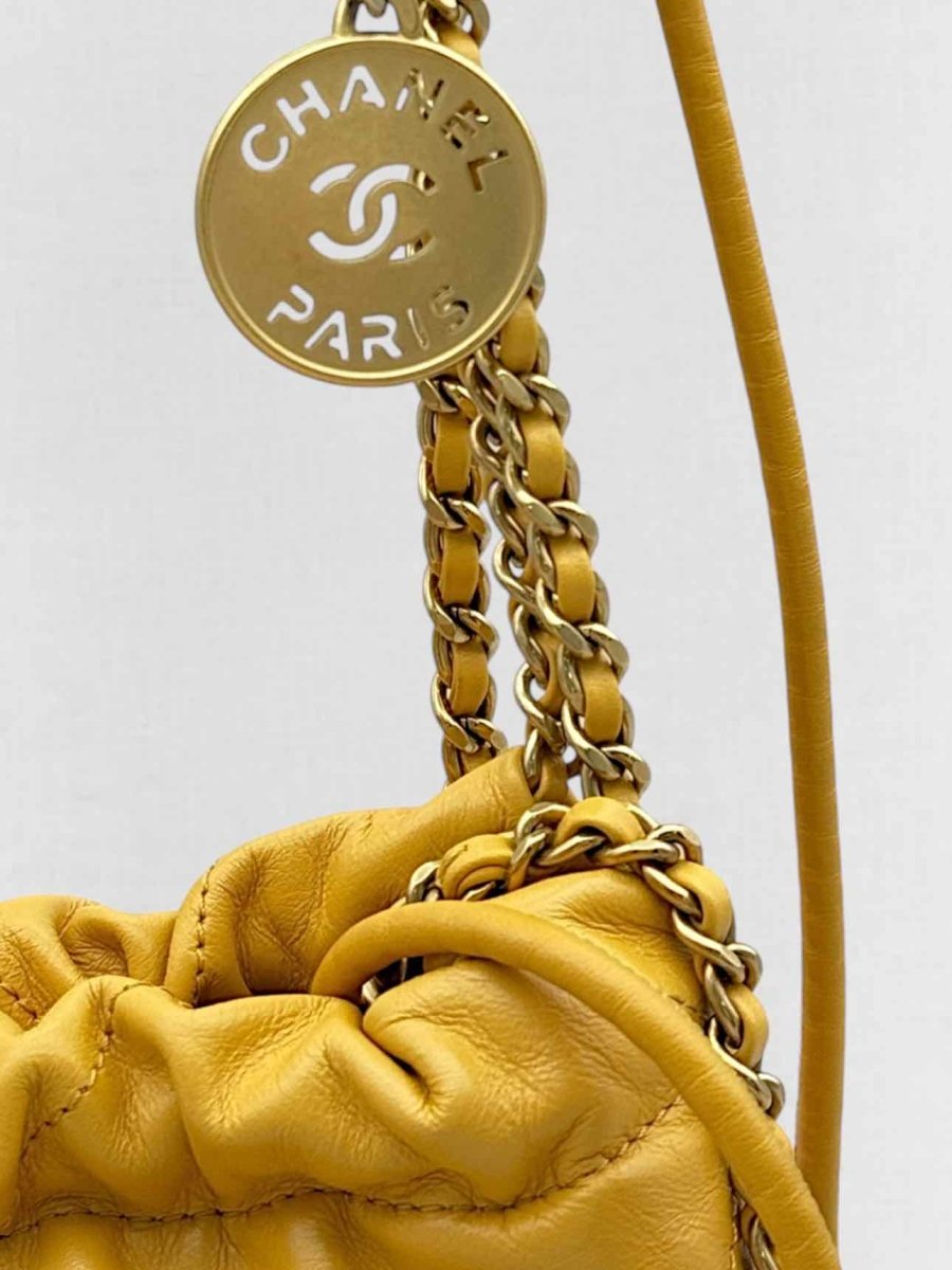Pre - loved CHANEL 22 Mustard Quilted Crossbody at Reems Closet