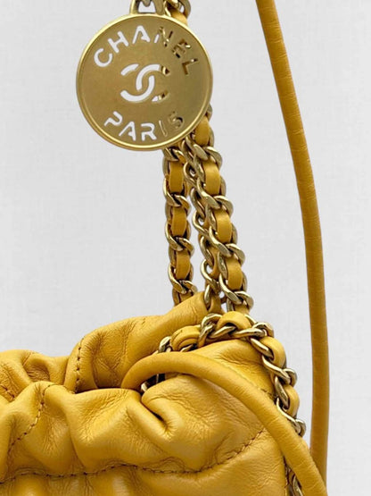 Pre - loved CHANEL 22 Mustard Quilted Crossbody at Reems Closet