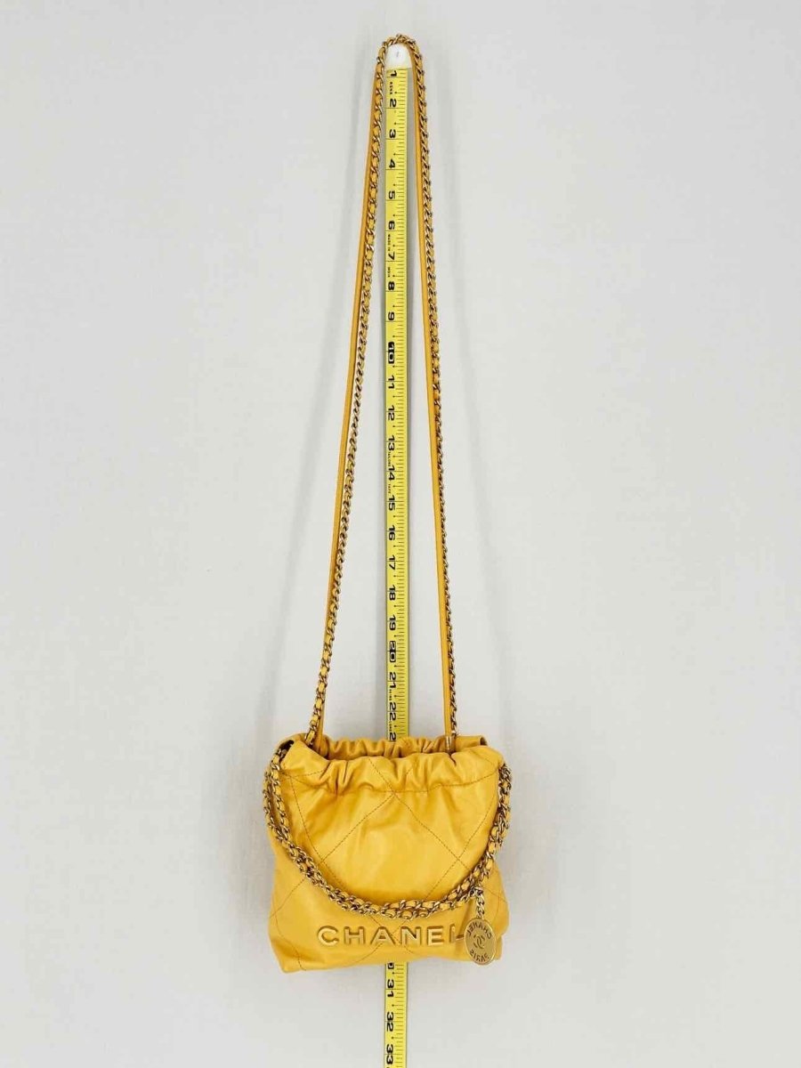 Pre - loved CHANEL 22 Mustard Quilted Crossbody at Reems Closet