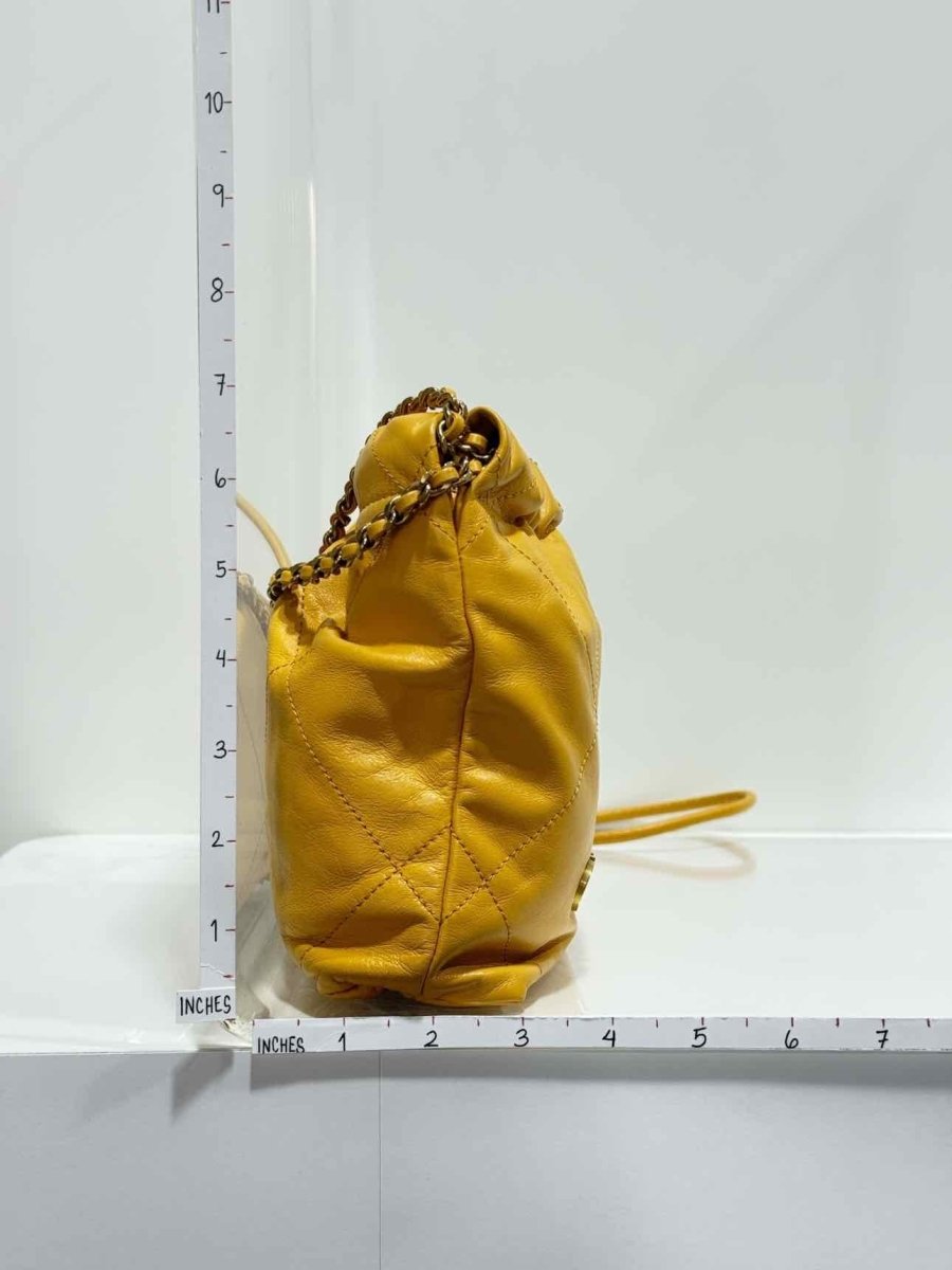 Pre - loved CHANEL 22 Mustard Quilted Crossbody at Reems Closet