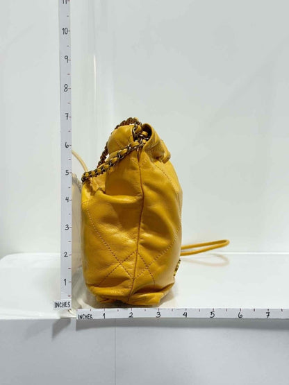 Pre - loved CHANEL 22 Mustard Quilted Crossbody at Reems Closet