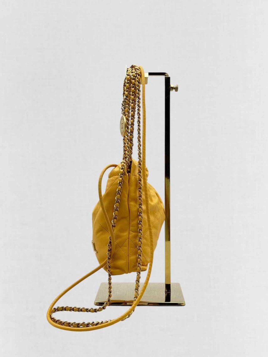 Pre - loved CHANEL 22 Mustard Quilted Crossbody at Reems Closet