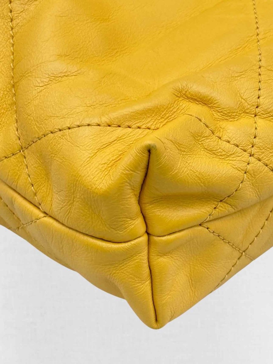 Pre - loved CHANEL 22 Mustard Quilted Crossbody at Reems Closet