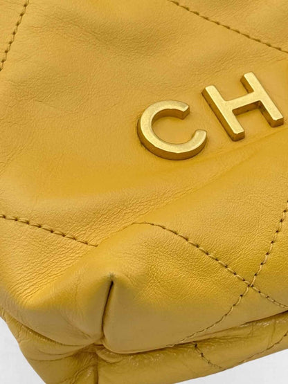 Pre - loved CHANEL 22 Mustard Quilted Crossbody at Reems Closet