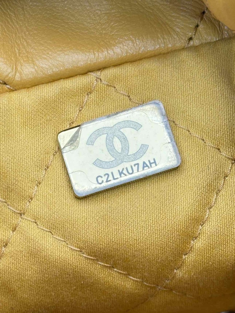 Pre - loved CHANEL 22 Mustard Quilted Crossbody at Reems Closet