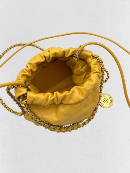 Pre - loved CHANEL 22 Mustard Quilted Crossbody at Reems Closet