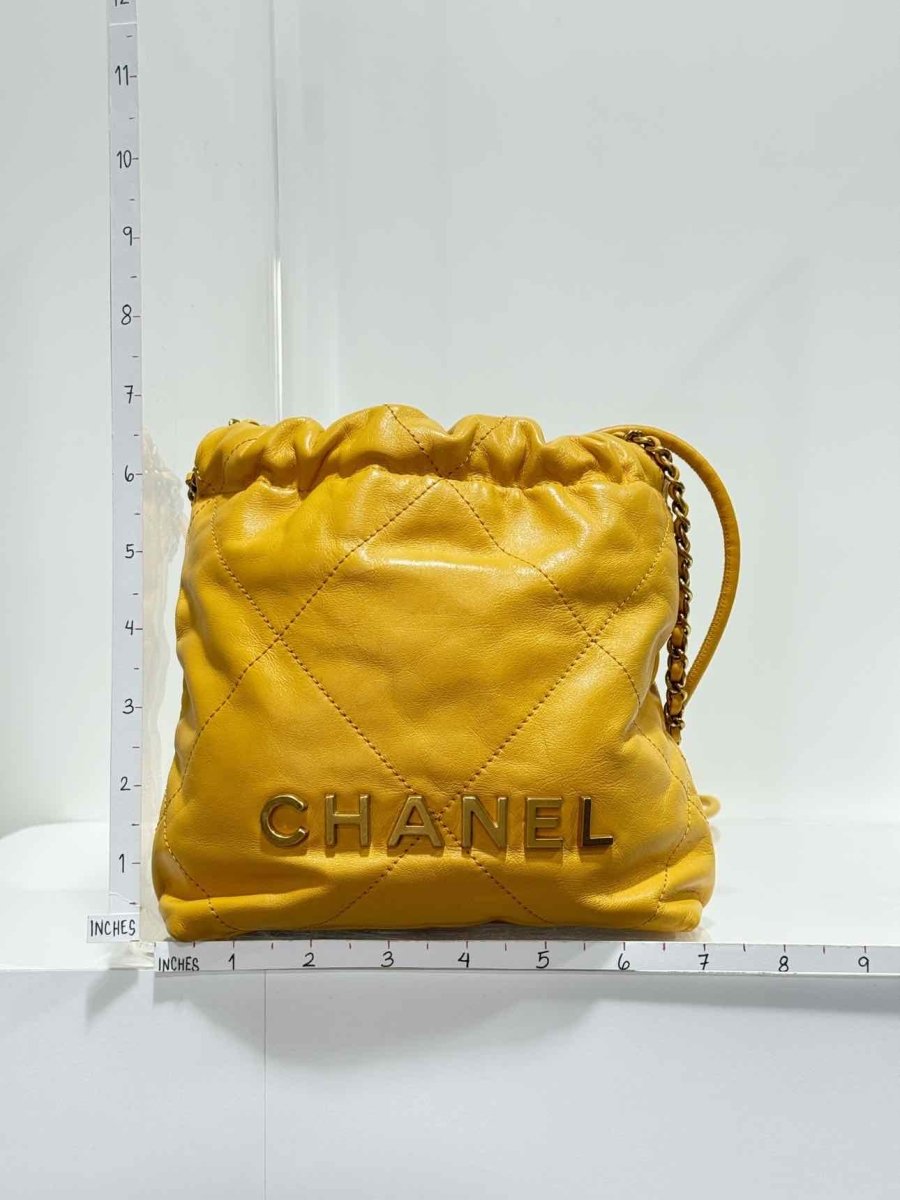 Pre - loved CHANEL 22 Mustard Quilted Crossbody at Reems Closet